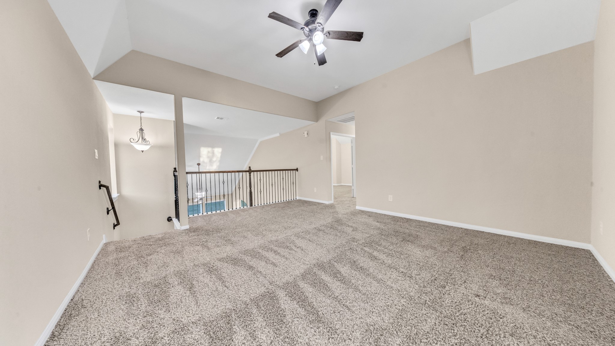 18118 Berry Garden Lane Spring, TX 77379 - Photo 31 of 45 a view of a livingroom with a ceiling fan and window