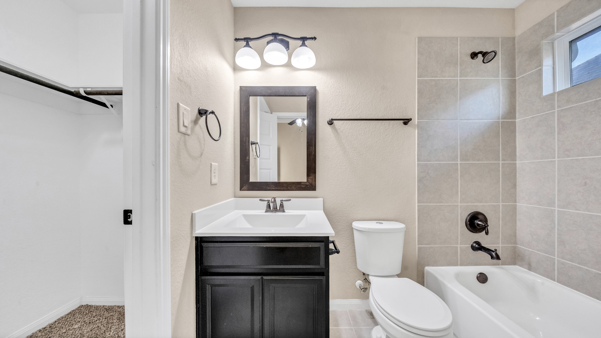18118 Berry Garden Lane Spring, TX 77379 - Photo 33 of 45 a bathroom with a sink toilet and shower