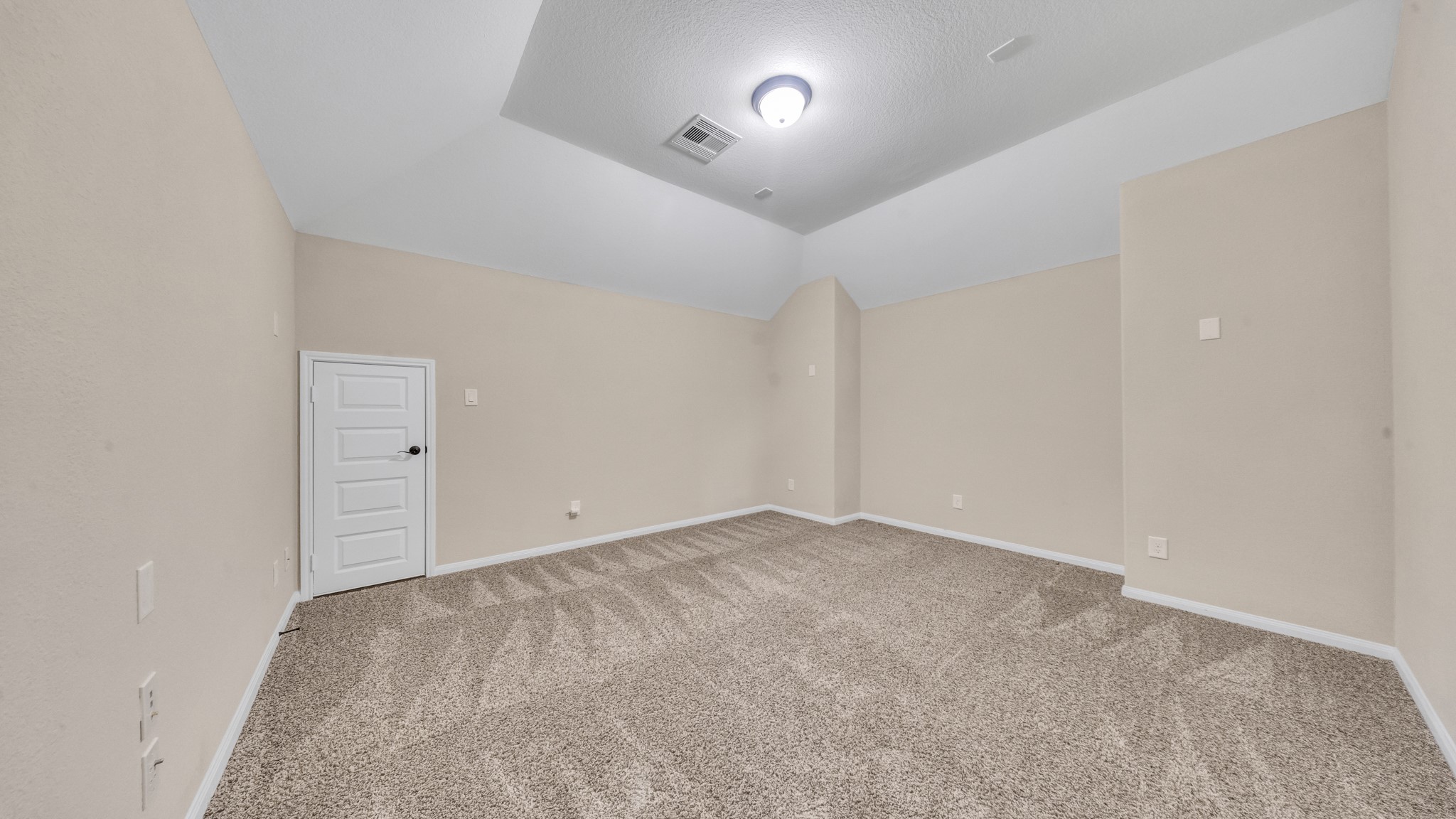 18118 Berry Garden Lane Spring, TX 77379 - Photo 37 of 45 an empty room with a ceiling fan and a window