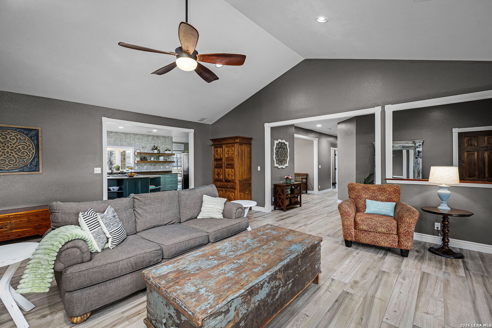 12700 Woman Hollering Road Schertz, TX 78154 - Photo 11 of 45 a living room with furniture and wooden floor