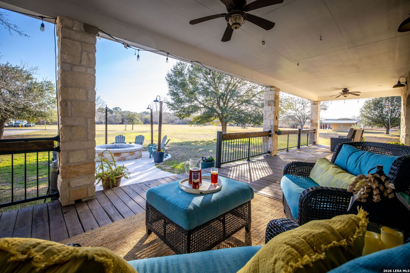 12700 Woman Hollering Road Schertz, TX 78154 - Photo 38 of 45 a living room with furniture and a floor to ceiling window