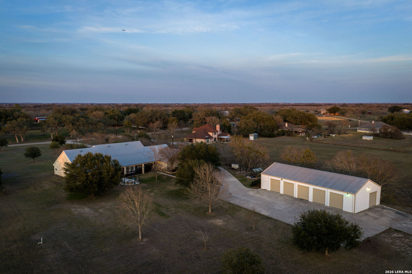 12700 Woman Hollering Road Schertz, TX 78154 - Photo 43 of 45 an aerial view of a house with a garden