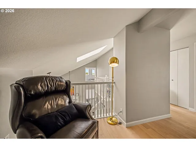 a view of a livingroom with furniture and wooden floor