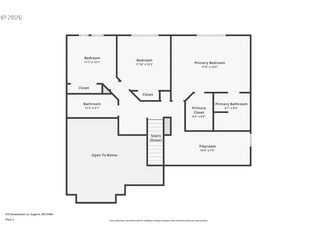 a view of a backyard with lawn chairs under an umbrella