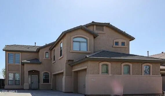 a front view of a house with windows