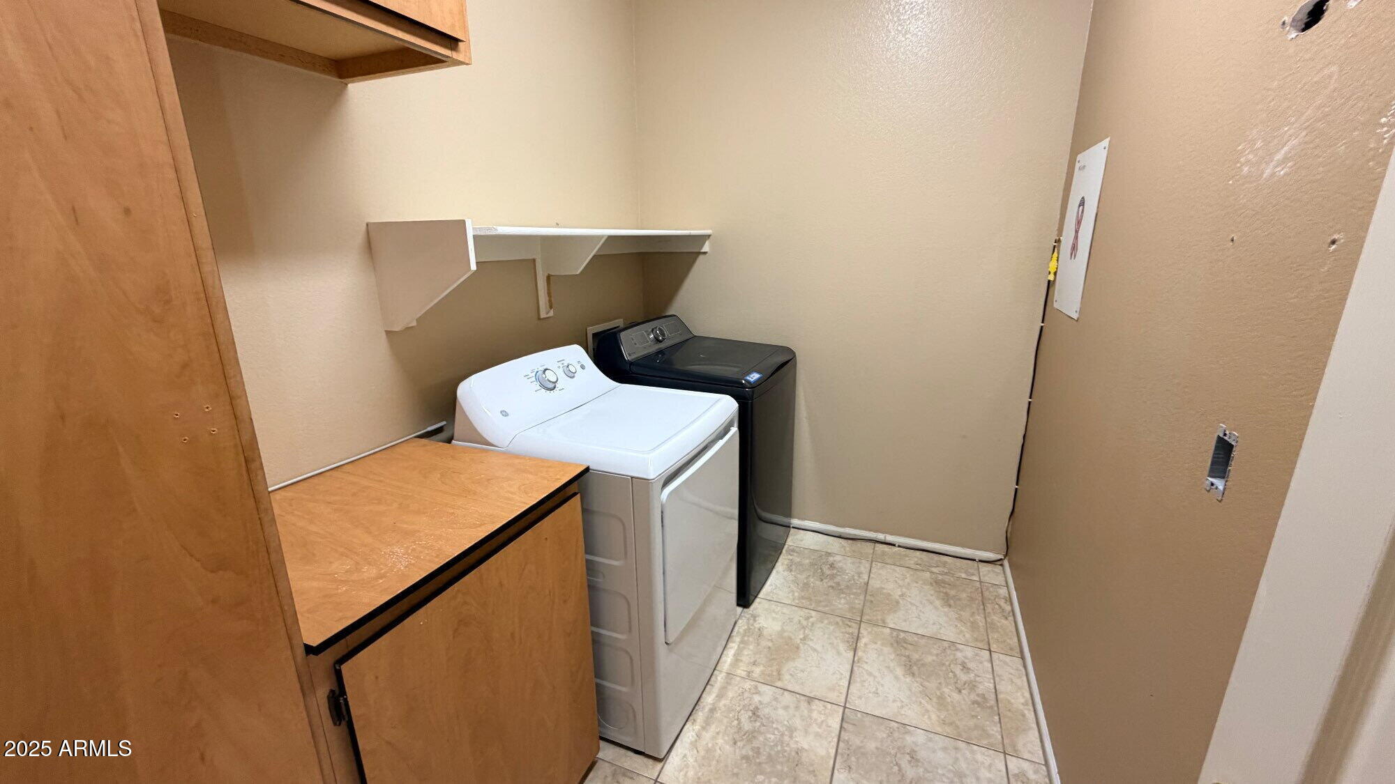 21549 Backus Drive Maricopa, AZ 85138 - Photo 13 of 28 a utility room with dryer and washer