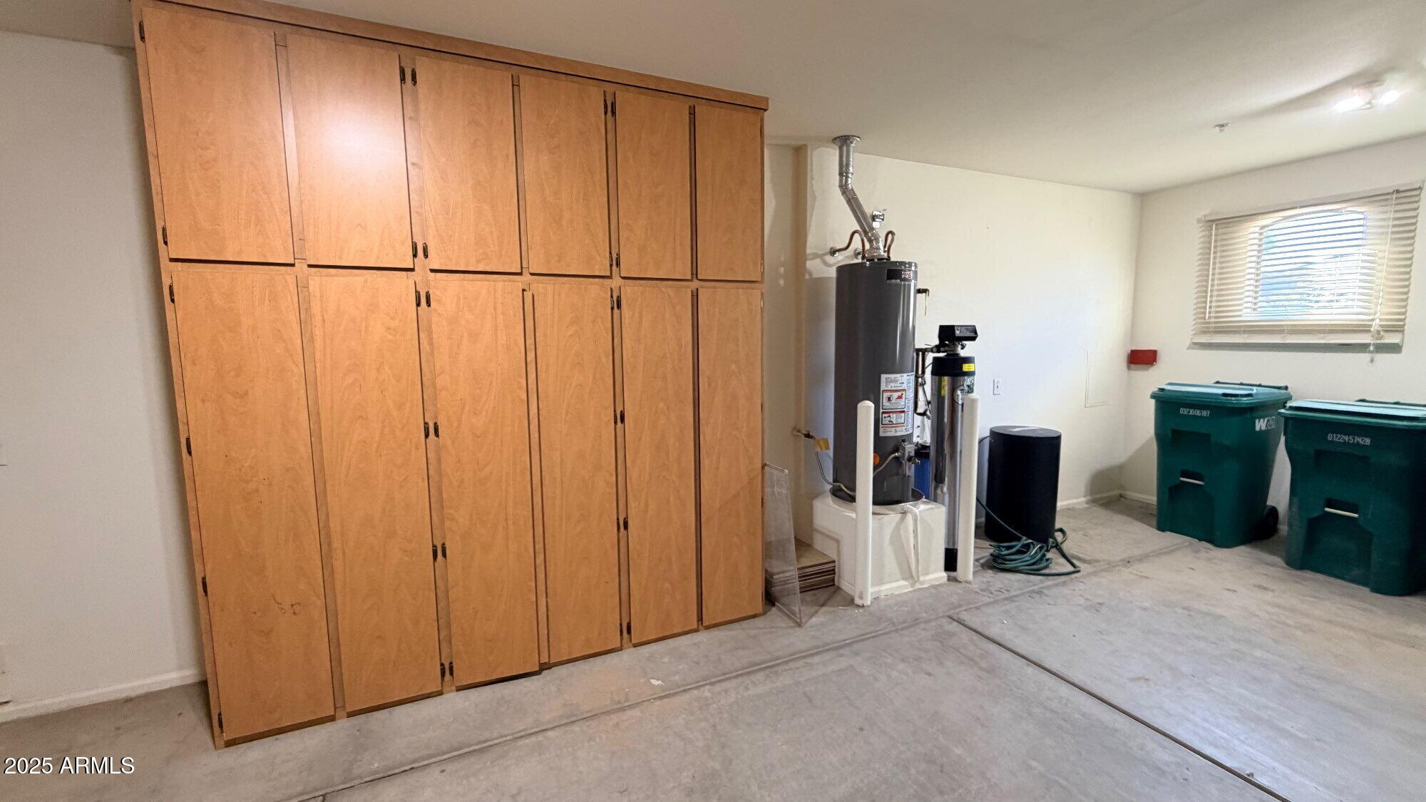 21549 Backus Drive Maricopa, AZ 85138 - Photo 17 of 28 a view of a storage & utility room with closet fan