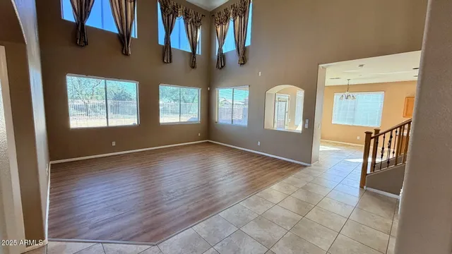 a view of an entryway with wooden floor