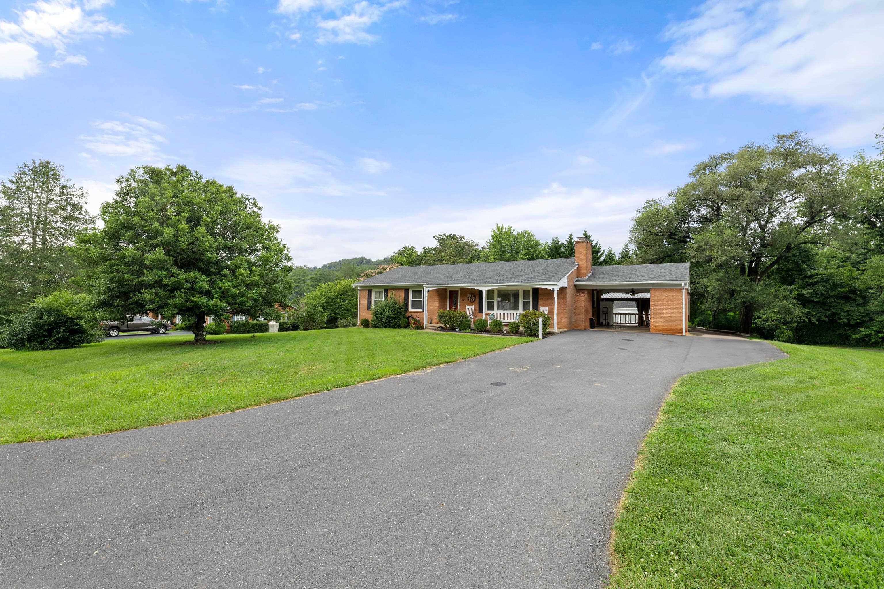 181 Ridge Street Lovingston, VA 22949 - Photo 2 of 56 a front view of house with yard and green space