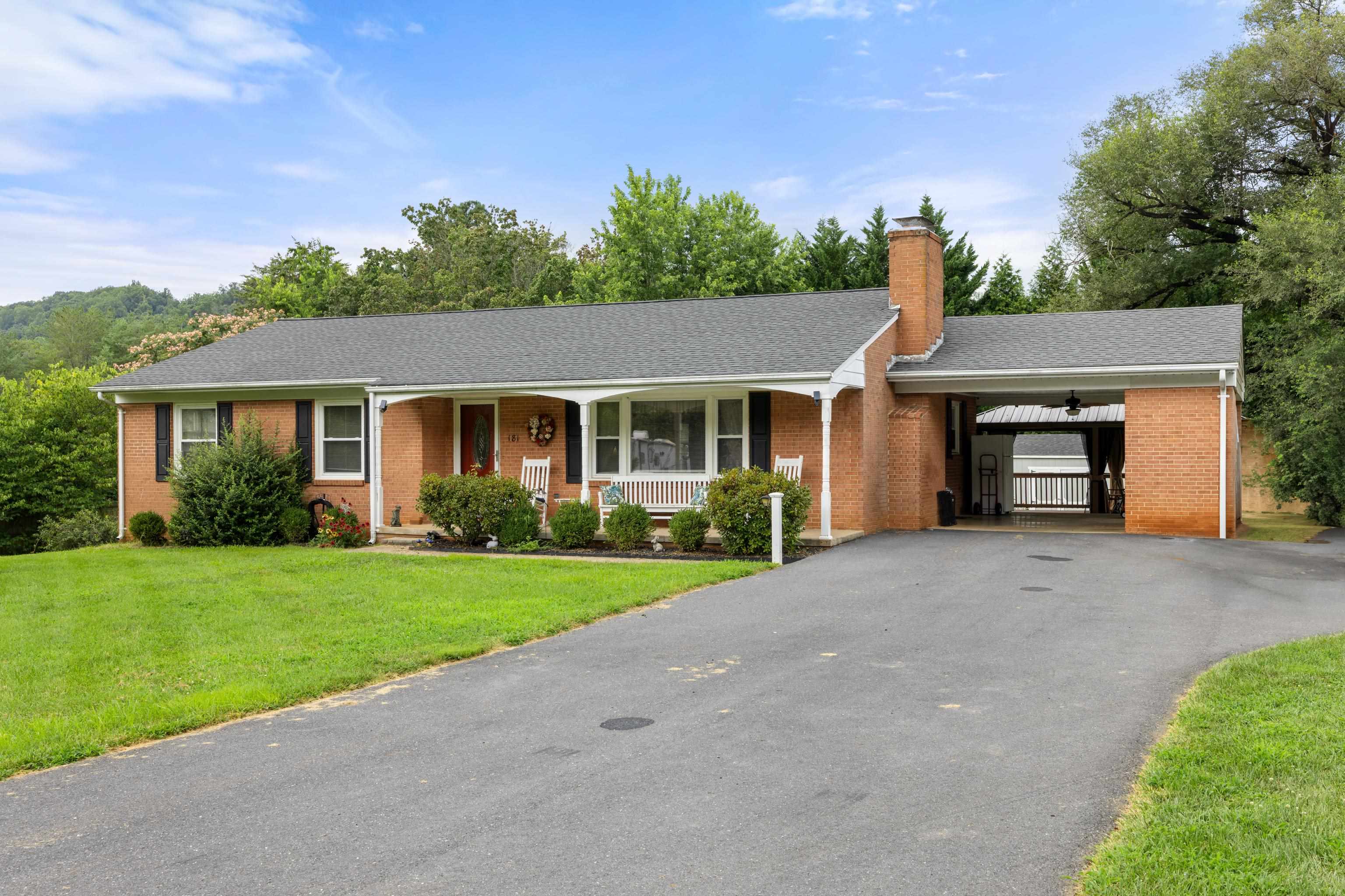 181 Ridge Street Lovingston, VA 22949 - Photo 3 of 56 front view of a house and a yard