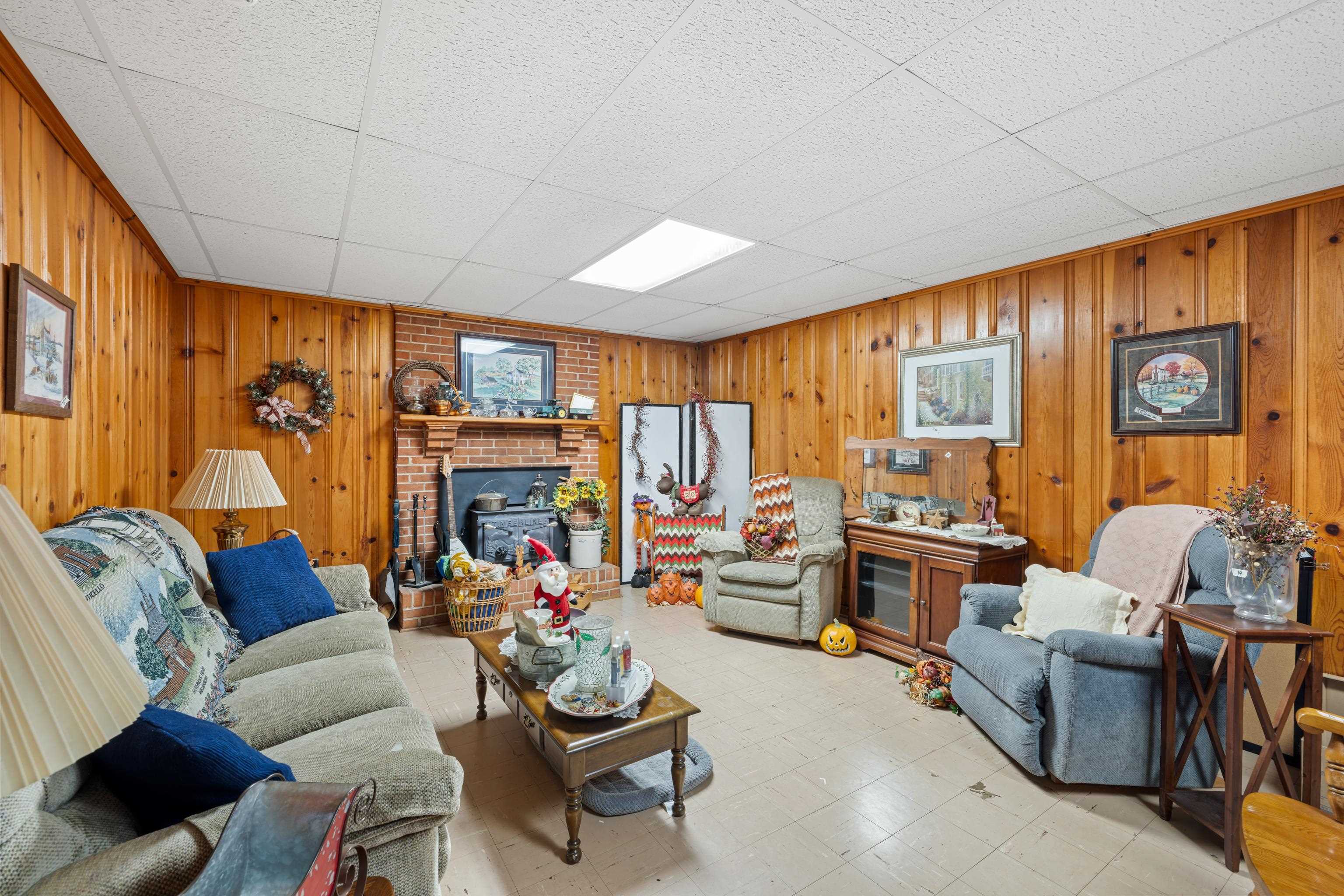 181 Ridge Street Lovingston, VA 22949 - Photo 36 of 56 a living room with furniture and a large window