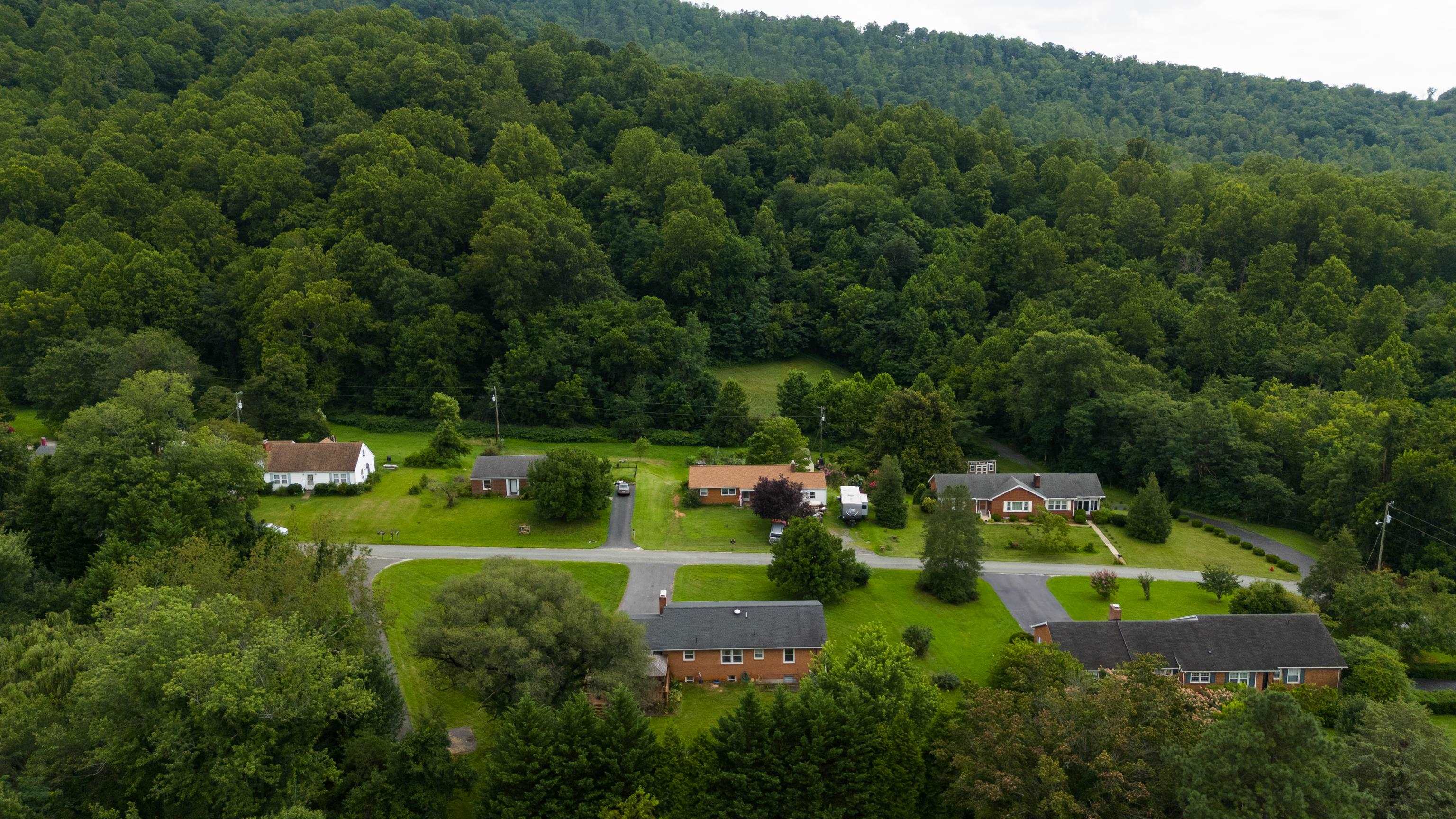 181 Ridge Street Lovingston, VA 22949 - Photo 53 of 56 an aerial view of a house with a yard