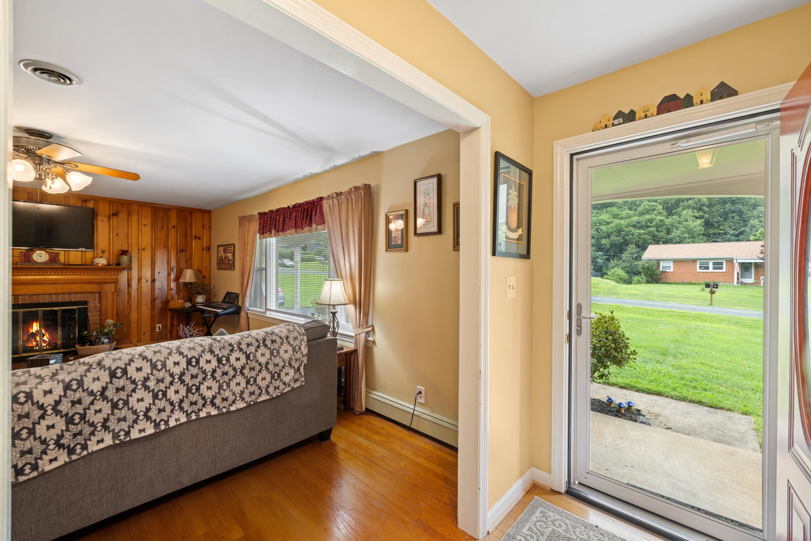 181 Ridge Street Lovingston, VA 22949 - Photo 7 of 56 a living room with furniture and a large window