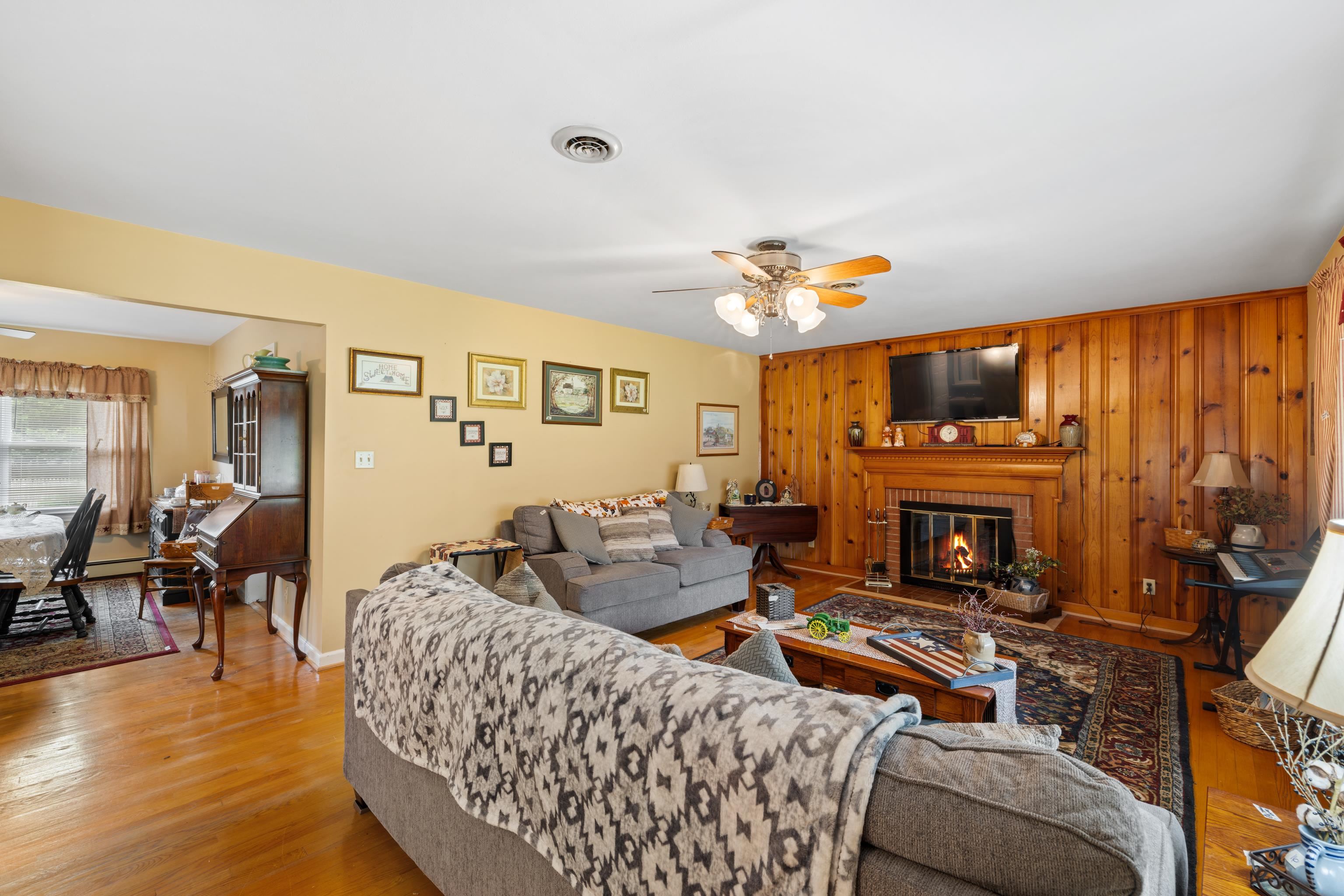 181 Ridge Street Lovingston, VA 22949 - Photo 8 of 56 a living room with furniture and a fireplace