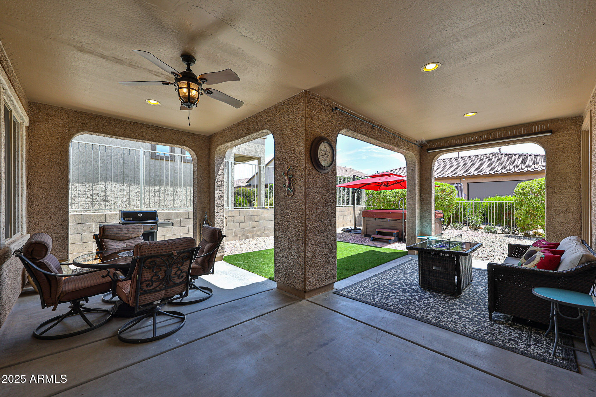 17563 West Fairview Street Goodyear, AZ 85338 - Photo 2 of 66 a living room with furniture and a large window