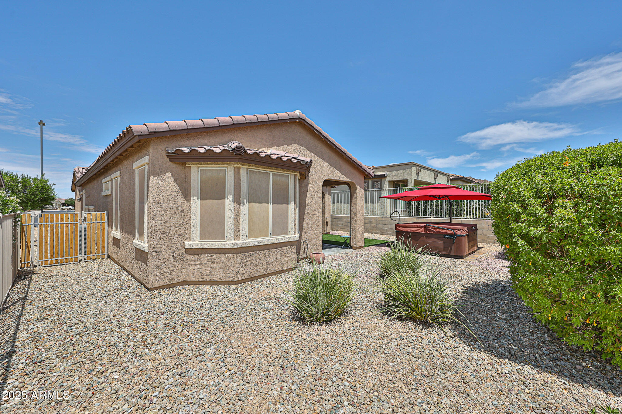 17563 West Fairview Street Goodyear, AZ 85338 - Photo 41 of 66 a front view of a house with a yard