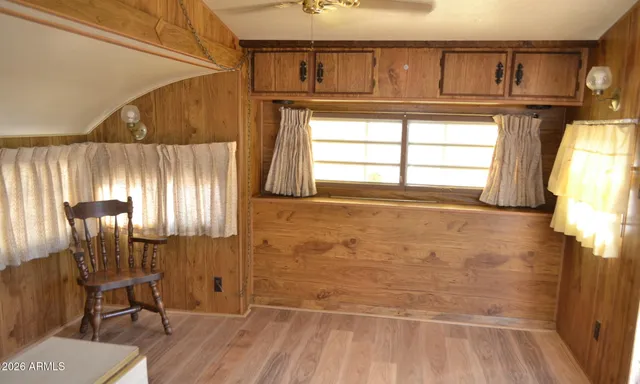 a view of entryway with wooden floor