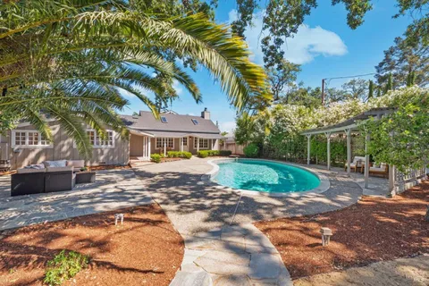 a view of a house with a yard