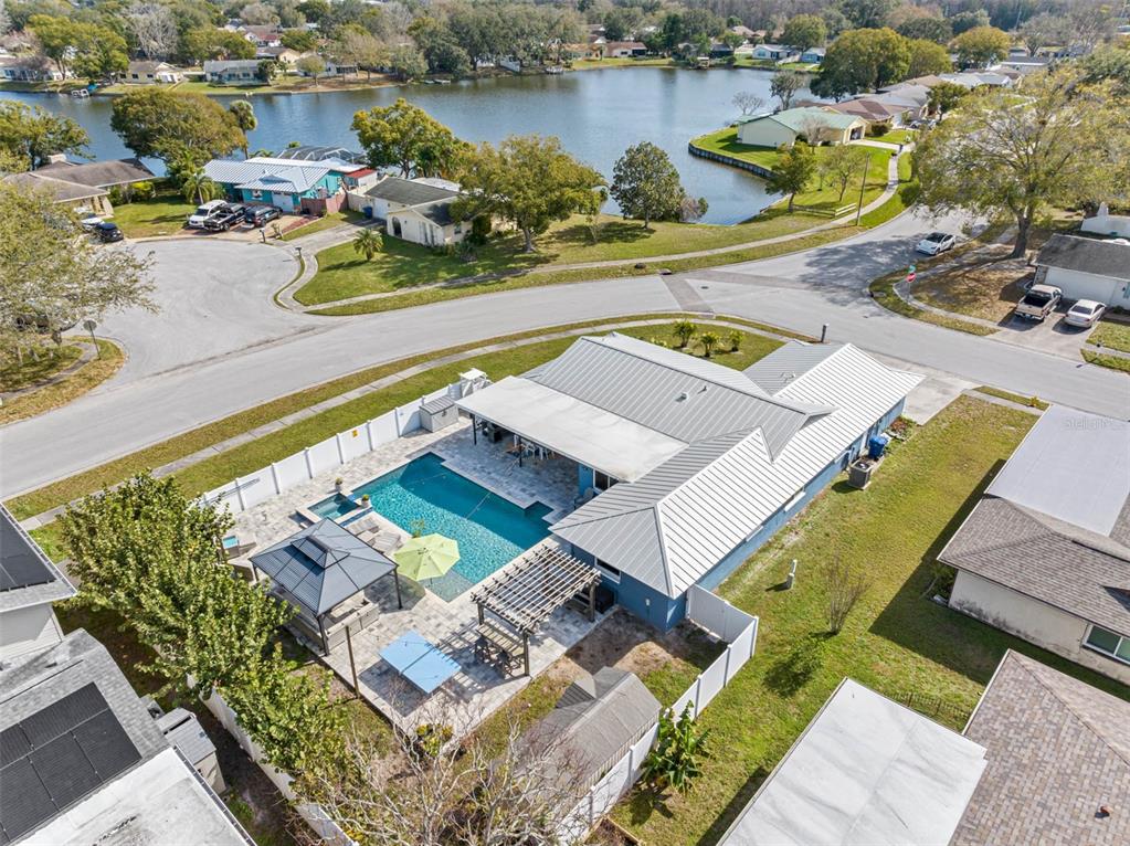 Undisclosed Address New Port Richey, FL 34653 - Photo 1 of 1 an aerial view of a house with outdoor space