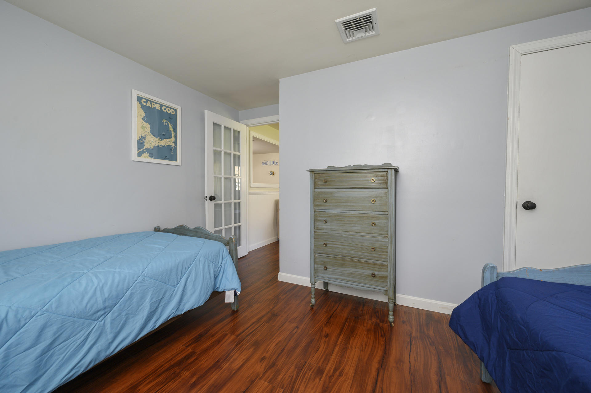 17 Farm Hill Road Centerville, MA 02632 - Photo 11 of 25 a bedroom with a bed and a dresser