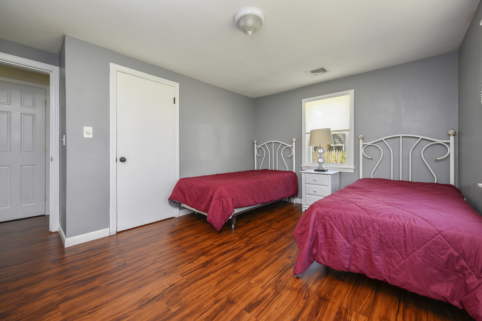 17 Farm Hill Road Centerville, MA 02632 - Photo 15 of 25 a bedroom with two beds and wooden floor