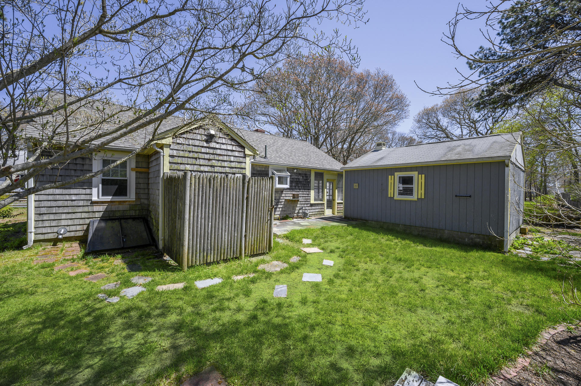 17 Farm Hill Road Centerville, MA 02632 - Photo 20 of 25 a view of a house with backyard and garden