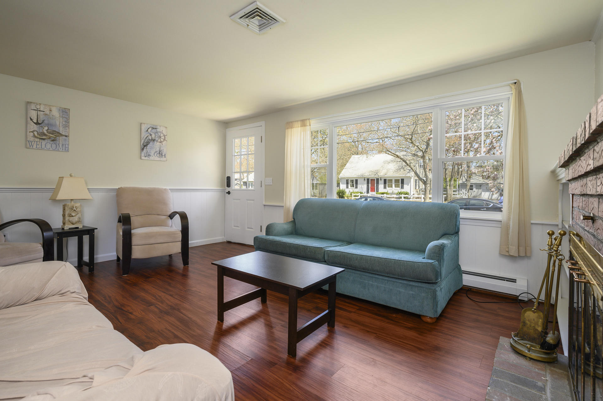 17 Farm Hill Road Centerville, MA 02632 - Photo 5 of 25 a living room with furniture and a large window