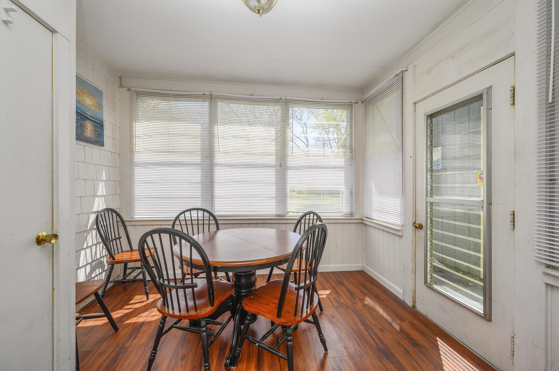 17 Farm Hill Road Centerville, MA 02632 - Photo 6 of 25 a view of a dining room with furniture and wooden floor