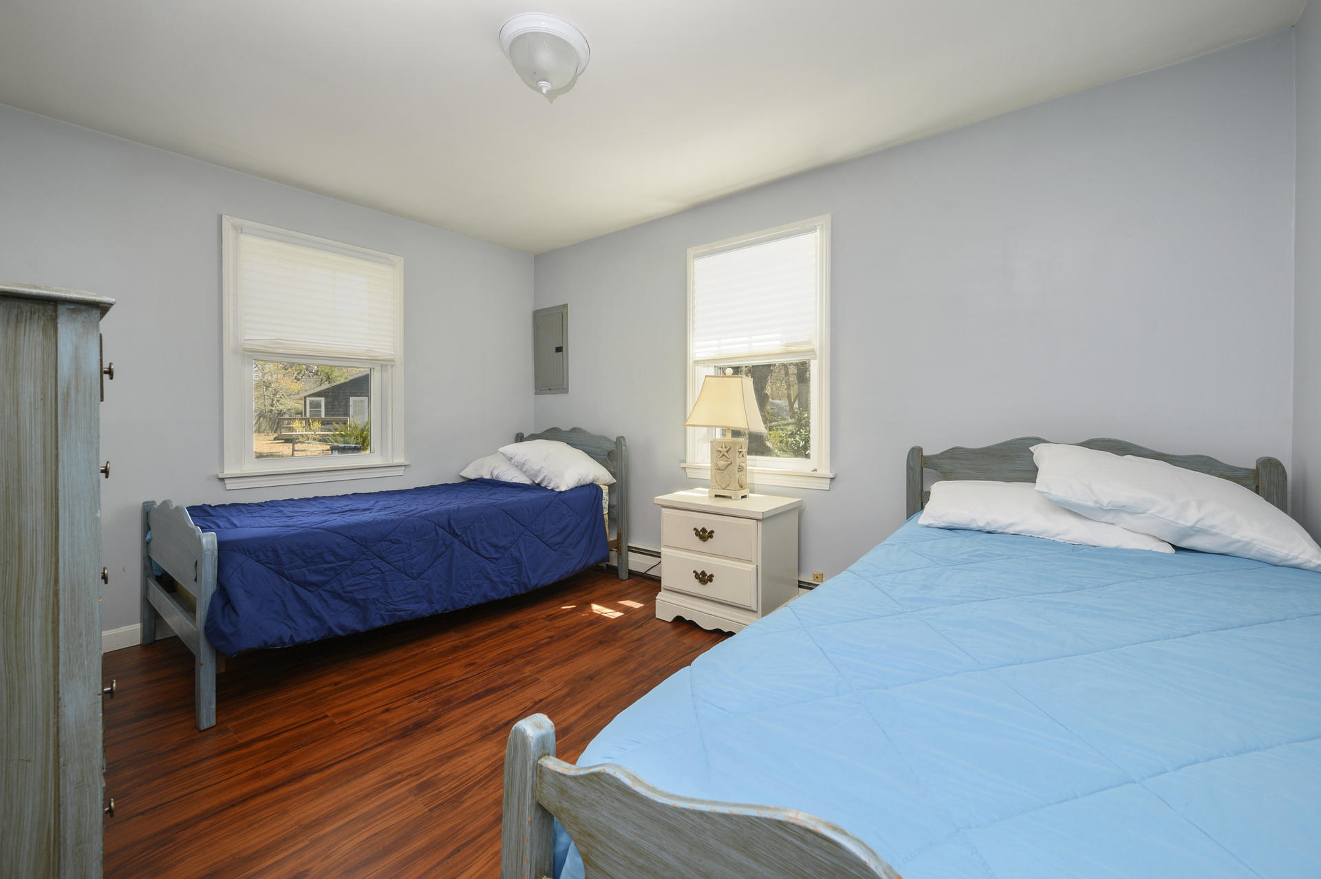 17 Farm Hill Road Centerville, MA 02632 - Photo 10 of 25 a bedroom with two beds and a window