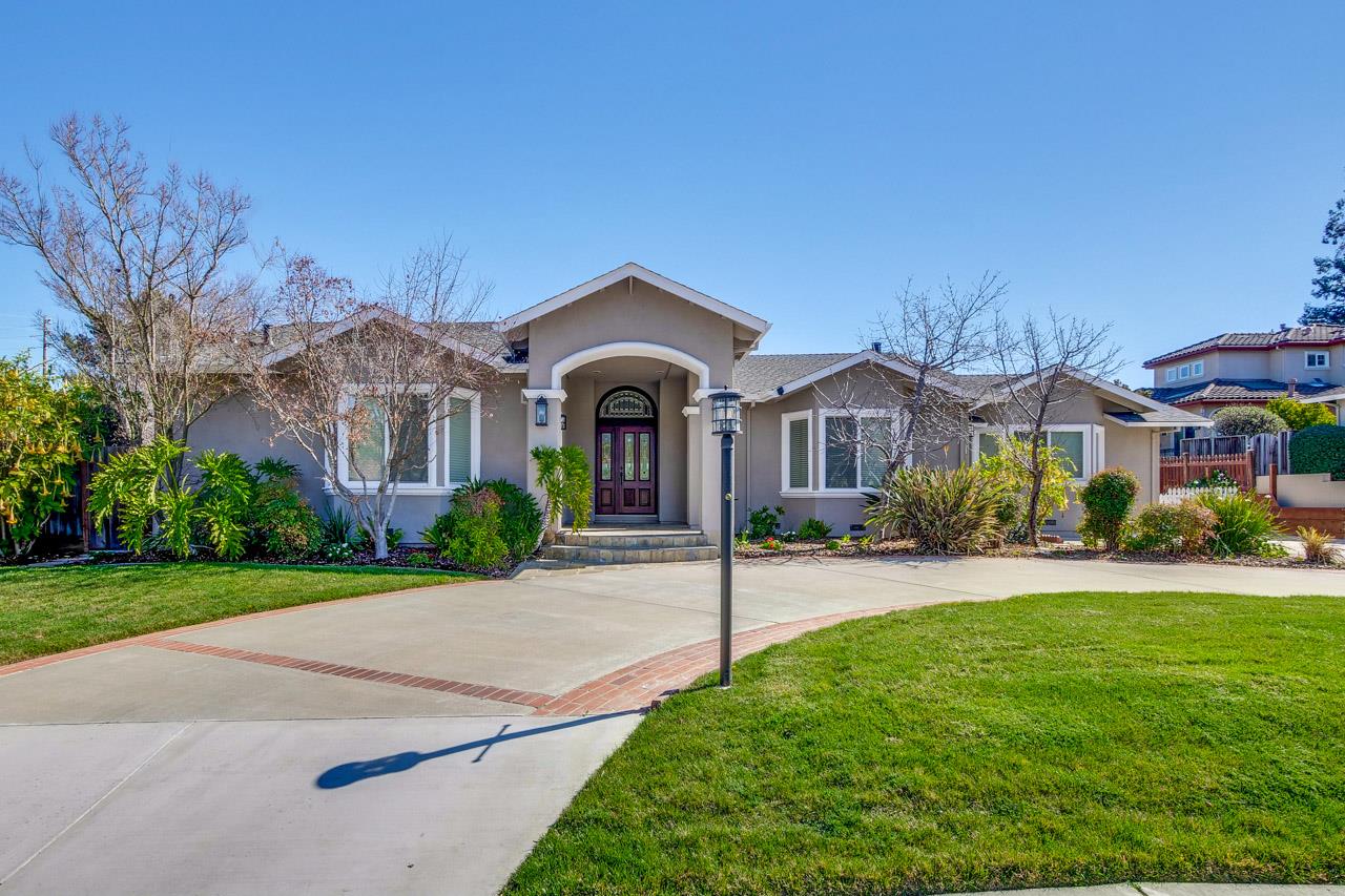 21972 McClellan Road Cupertino, CA 95014 - Photo 2 of 15 a front view of house with yard and green space