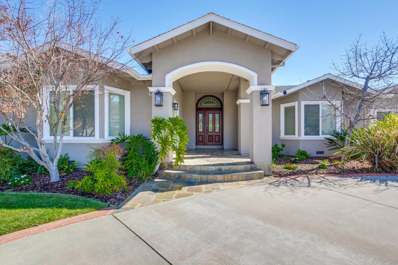 21972 McClellan Road Cupertino, CA 95014 - Photo 4 of 15 a front view of a house with garden