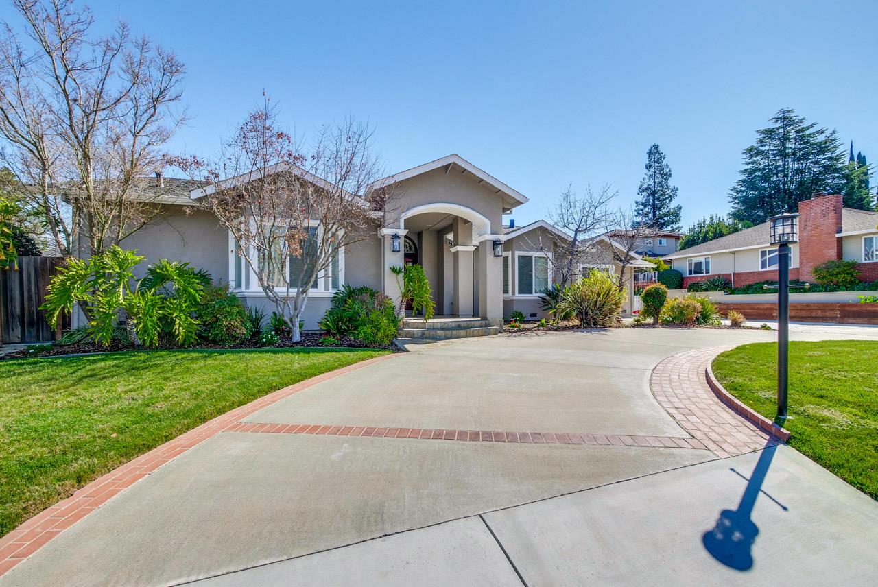 21972 McClellan Road Cupertino, CA 95014 - Photo 5 of 15 a front view of a house with garden