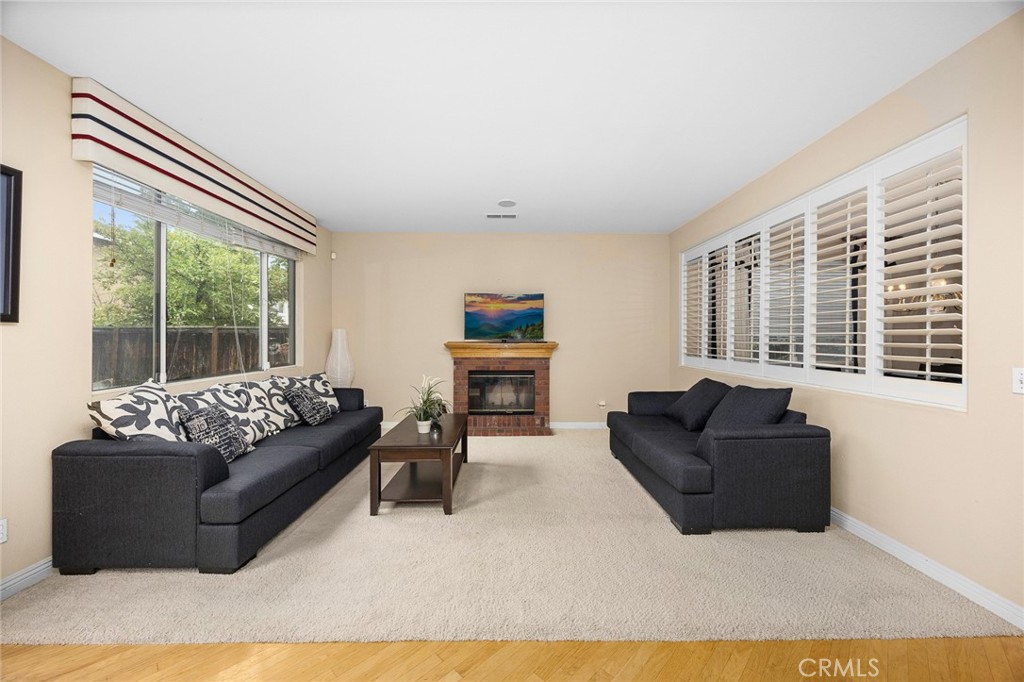 7343 Legacy Place Rancho Cucamonga, CA 91730 - Photo 11 of 53 a living room with furniture and a large window