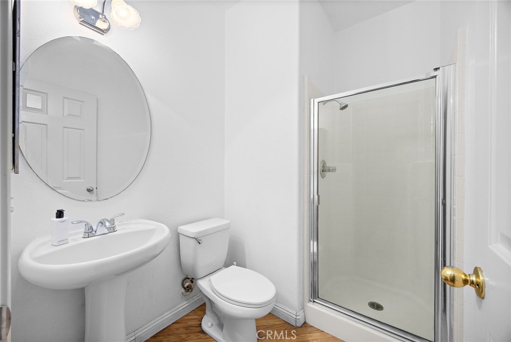 7343 Legacy Place Rancho Cucamonga, CA 91730 - Photo 19 of 53 a bathroom with a sink toilet and shower