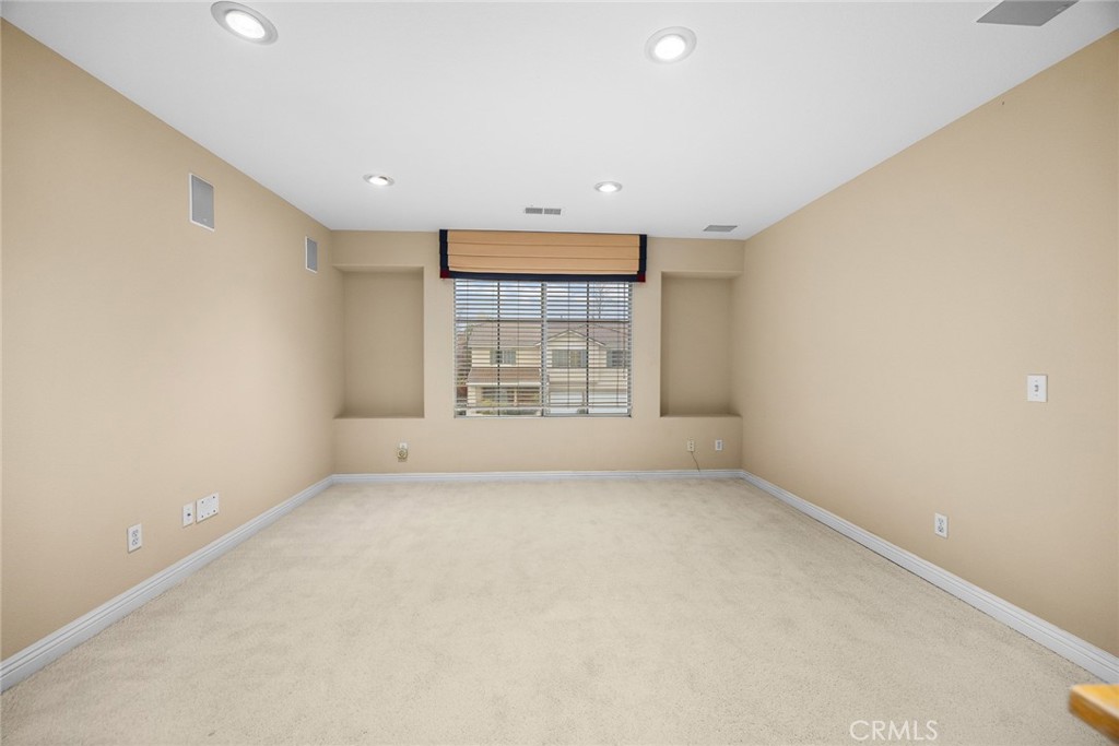 7343 Legacy Place Rancho Cucamonga, CA 91730 - Photo 22 of 53 an empty room with windows