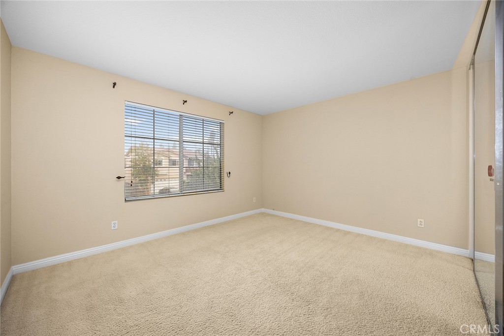 7343 Legacy Place Rancho Cucamonga, CA 91730 - Photo 31 of 53 an empty room with windows