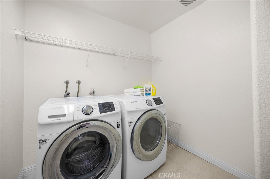 7343 Legacy Place Rancho Cucamonga, CA 91730 - Photo 34 of 53 a utility room with dryer and washer