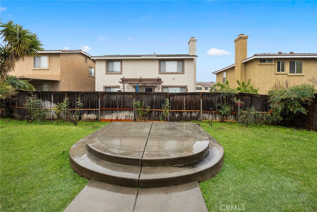 7343 Legacy Place Rancho Cucamonga, CA 91730 - Photo 36 of 53 a view of a house with a backyard