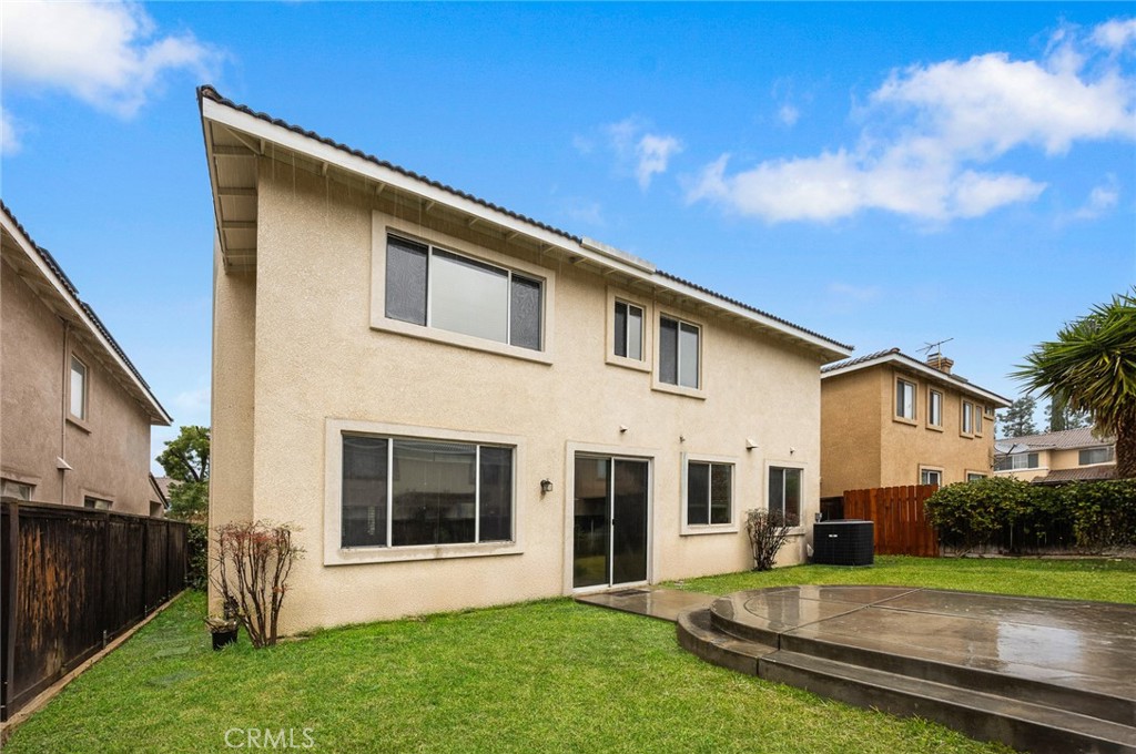 7343 Legacy Place Rancho Cucamonga, CA 91730 - Photo 37 of 53 a view of a house with backyard and garden