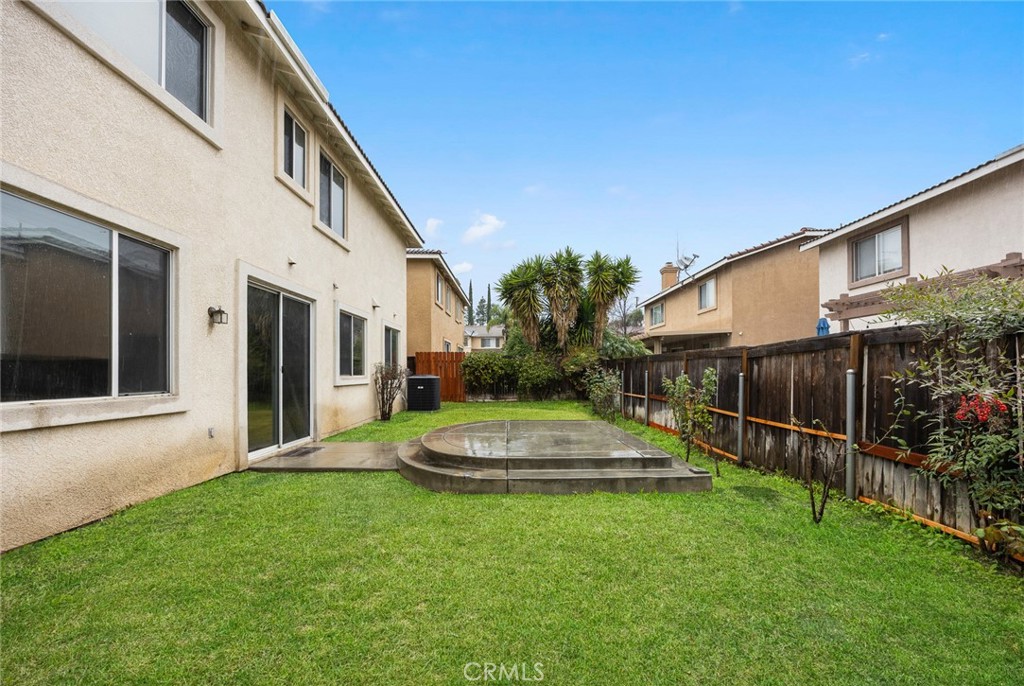 7343 Legacy Place Rancho Cucamonga, CA 91730 - Photo 38 of 53 a view of a house with backyard and garden
