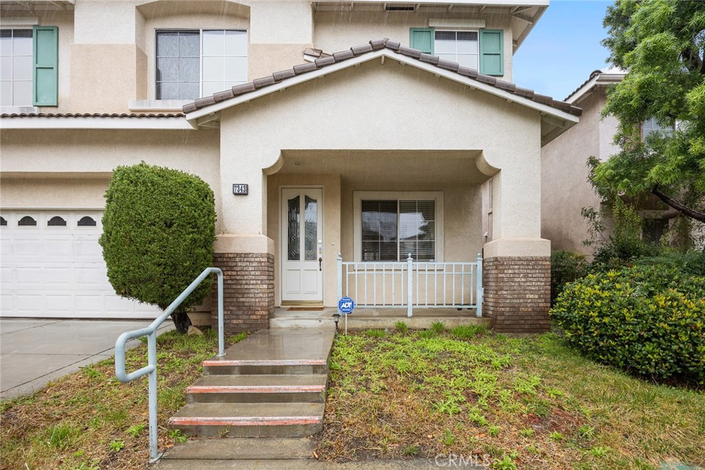 7343 Legacy Place Rancho Cucamonga, CA 91730 - Photo 5 of 53 a view of a house with wooden fence and two windows