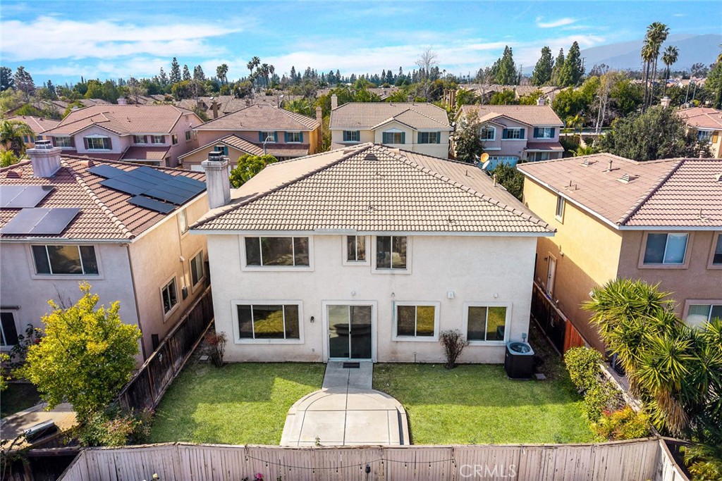 7343 Legacy Place Rancho Cucamonga, CA 91730 - Photo 53 of 53 a aerial view of a house with a big yard and potted plants