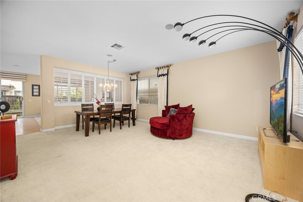 7343 Legacy Place Rancho Cucamonga, CA 91730 - Photo 7 of 53 a very nice looking room with a large window