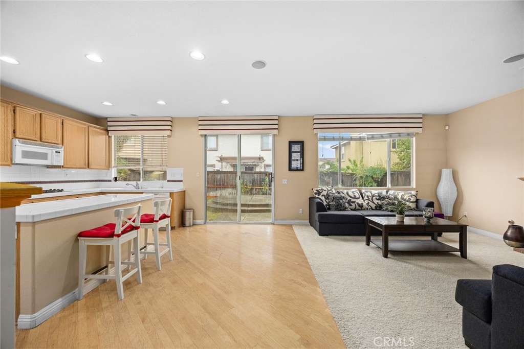 7343 Legacy Place Rancho Cucamonga, CA 91730 - Photo 10 of 53 a living room with furniture and a large window