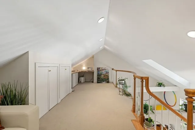 a view of a hallway with staircase