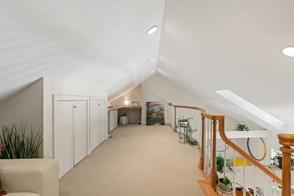 76 Boylston Street, Unit 4 Newton, MA 02467 - Photo 4 of 14 a view of a hallway with staircase