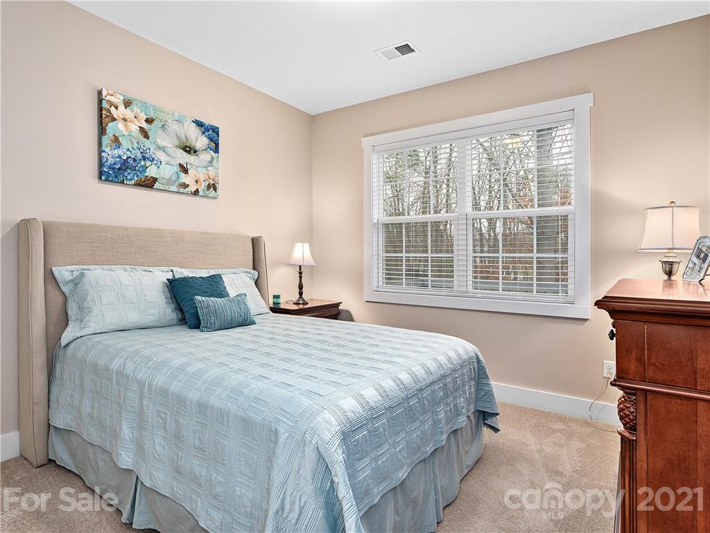 146 Grove End Road Fletcher, NC 28732 - Photo 14 of 22 a bedroom with bed and a window