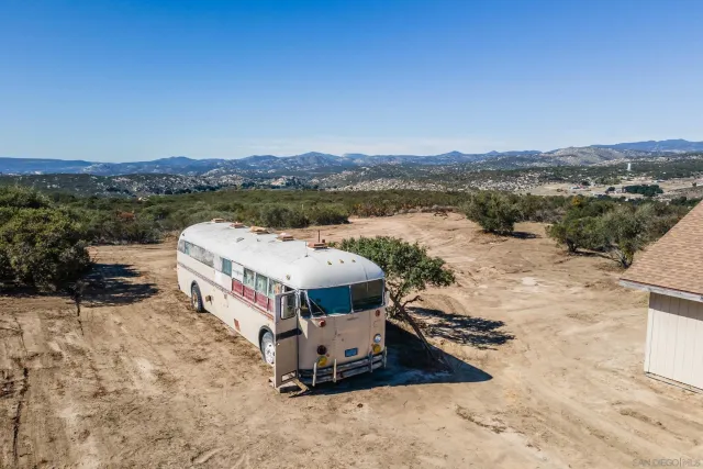 an aerial view of a town with couple of houses