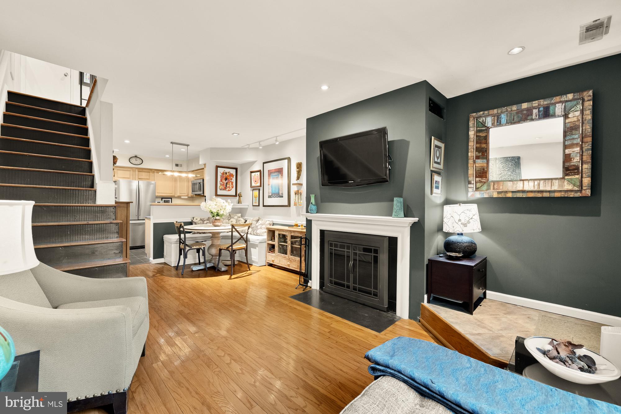 1715 15th Street Northwest, Unit 44 Washington, DC 20009 - Photo 2 of 26 Rich hardwood floors and wood-burning fireplace