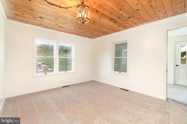 a view of a room that has a window in it